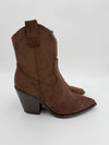 Brown suede ankle cowboy boot with a block heel on a white background